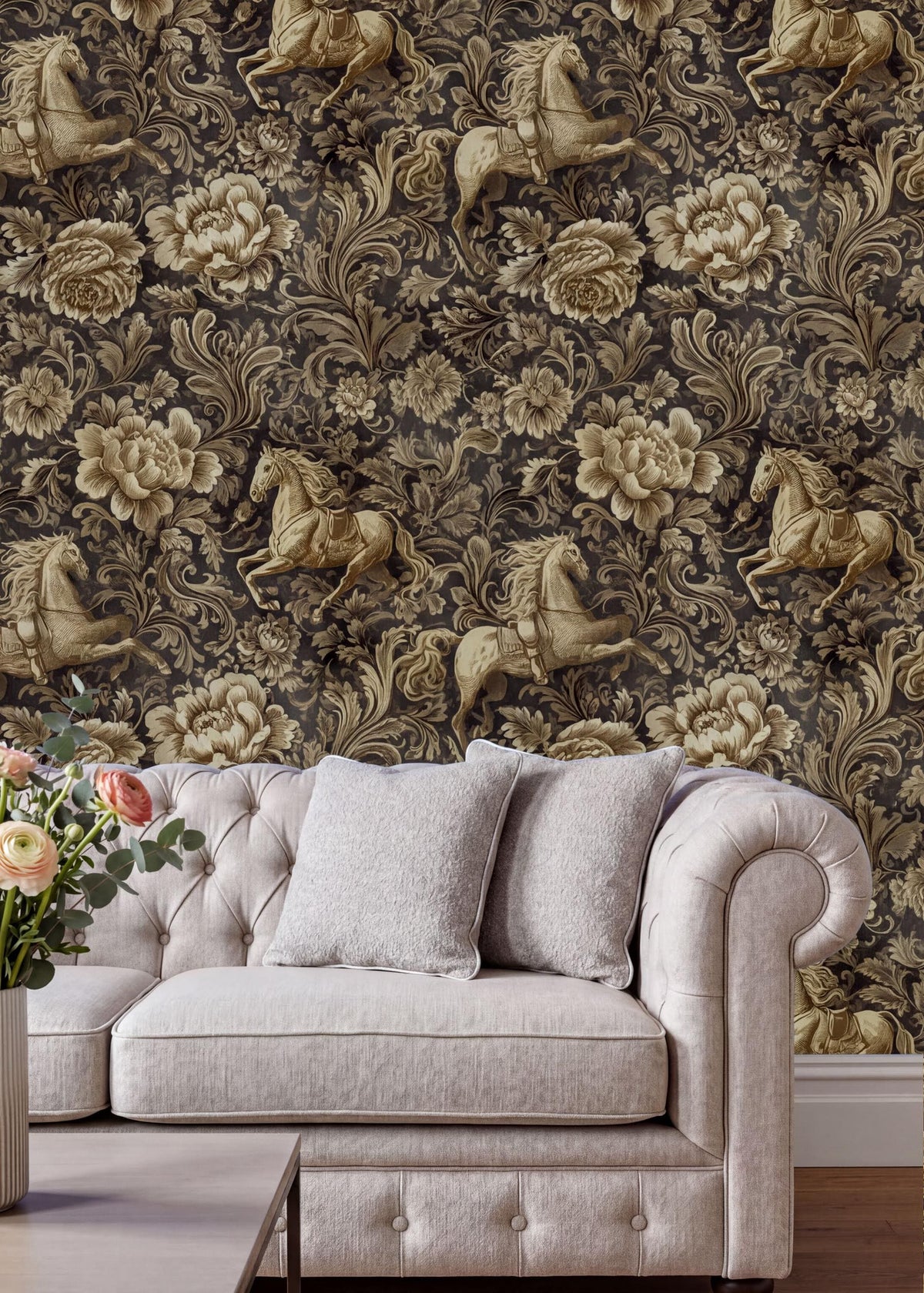 a living room with a white tufted sofa and a coffee table. The sofa is positioned against a wall with a floral wallpaper pattern. The coffee table is placed in front of the sofa, creating a cozy and inviting seating area.