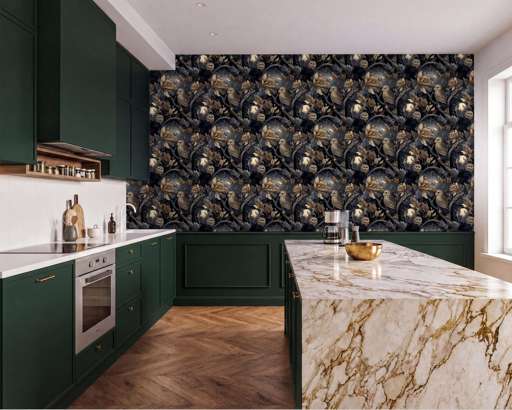 a modern kitchen with a marble countertop and dark green cabinets. The countertop has a gold bowl on it, and the walls are covered in a patterned wallpaper.