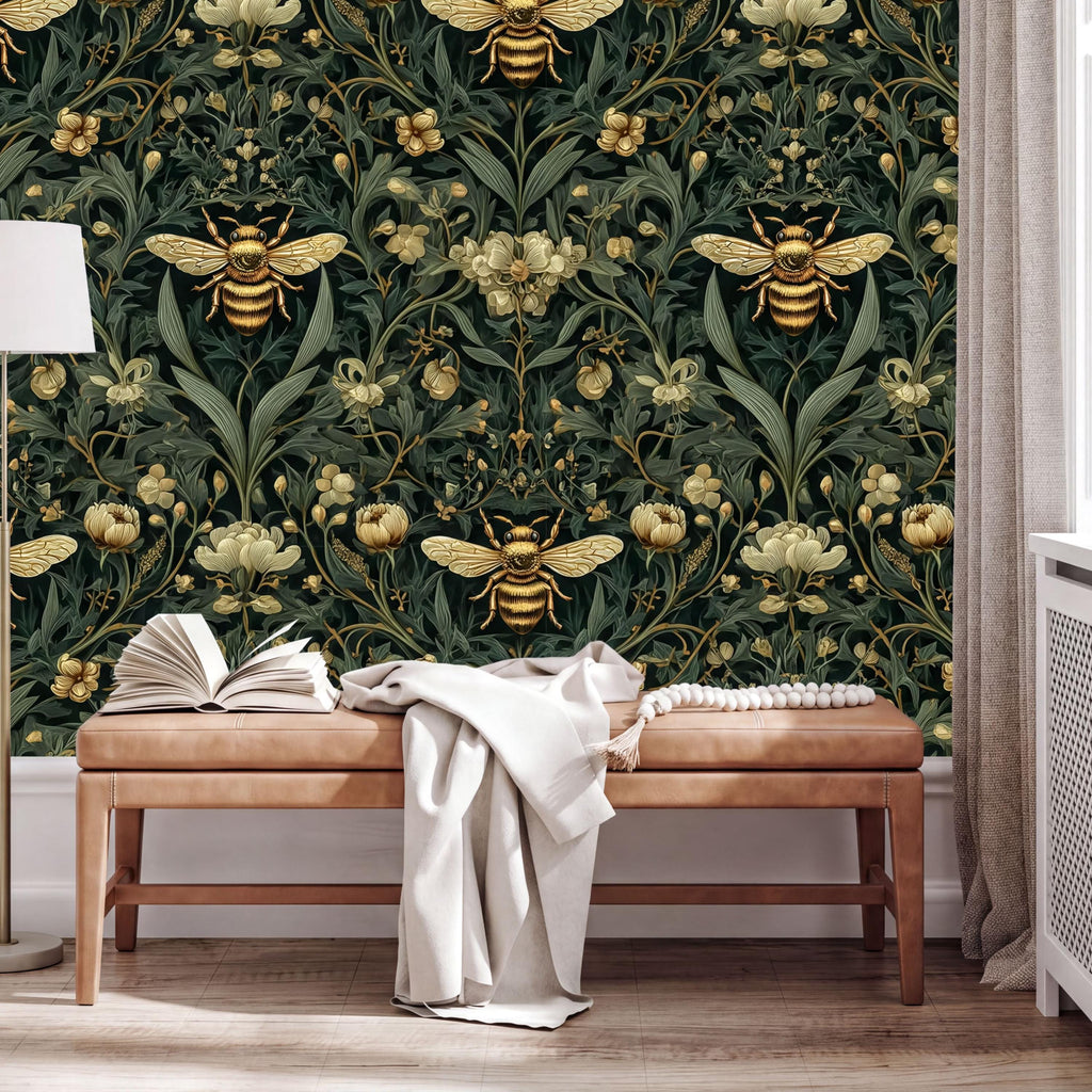 a wooden bench with an open book on it, set against a wall with a detailed wallpaper design of green leaves, gold flowers, and bees.