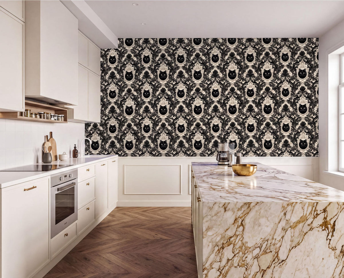 a modern kitchen with a marble countertop and a black and white damask wallpaper featuring a repeating pattern of cat faces. The kitchen is well-equipped with white cabinets and a stainless steel oven.