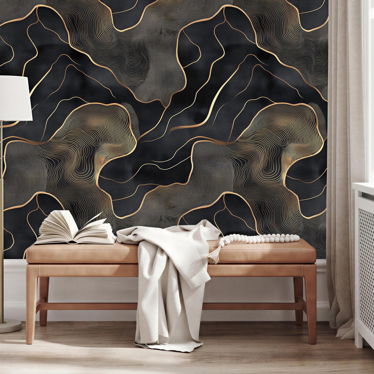 a modern living room with a dark and gold abstract wallpaper design on the wall behind a wooden bench. The bench is positioned in front of the wall, and there are two open books on it.