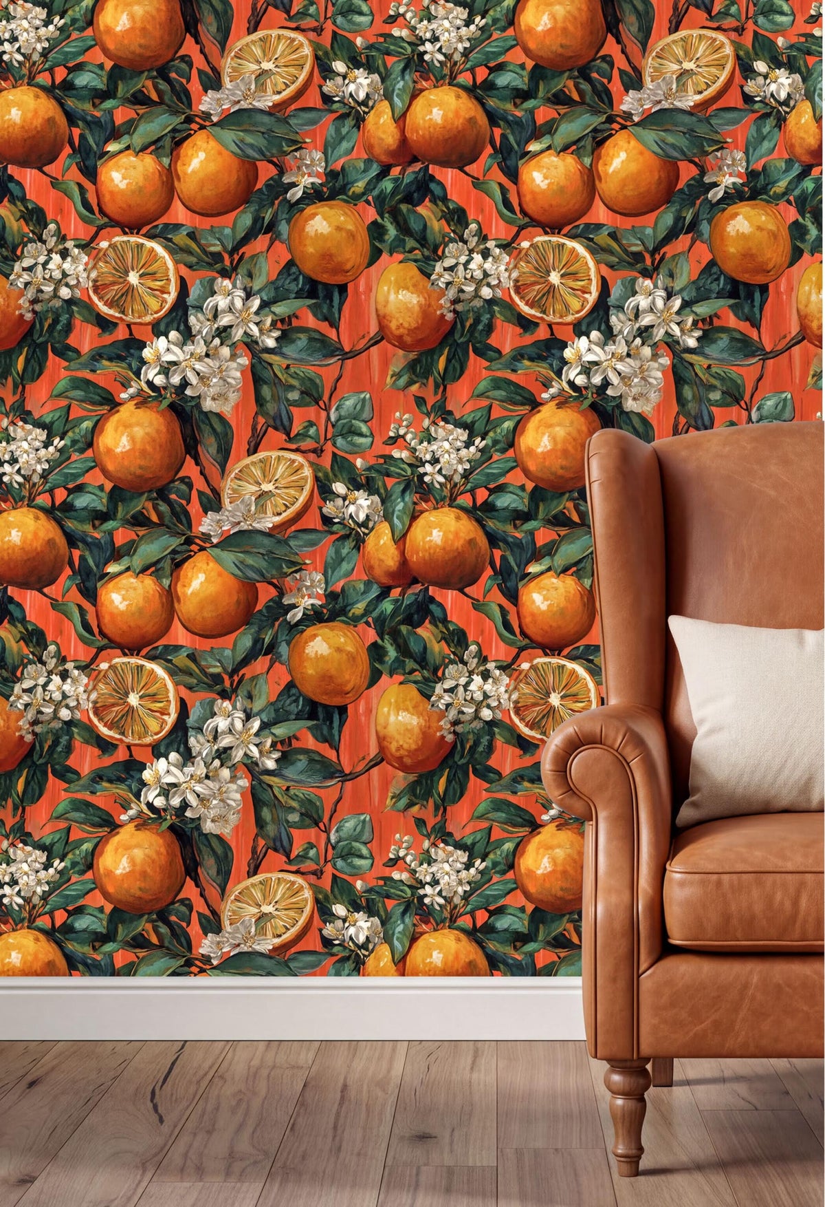 a vibrant orange and white floral wallpaper with a repeating pattern of oranges and white flowers. The wallpaper is set against a brown leather armchair, creating a warm and inviting atmosphere.