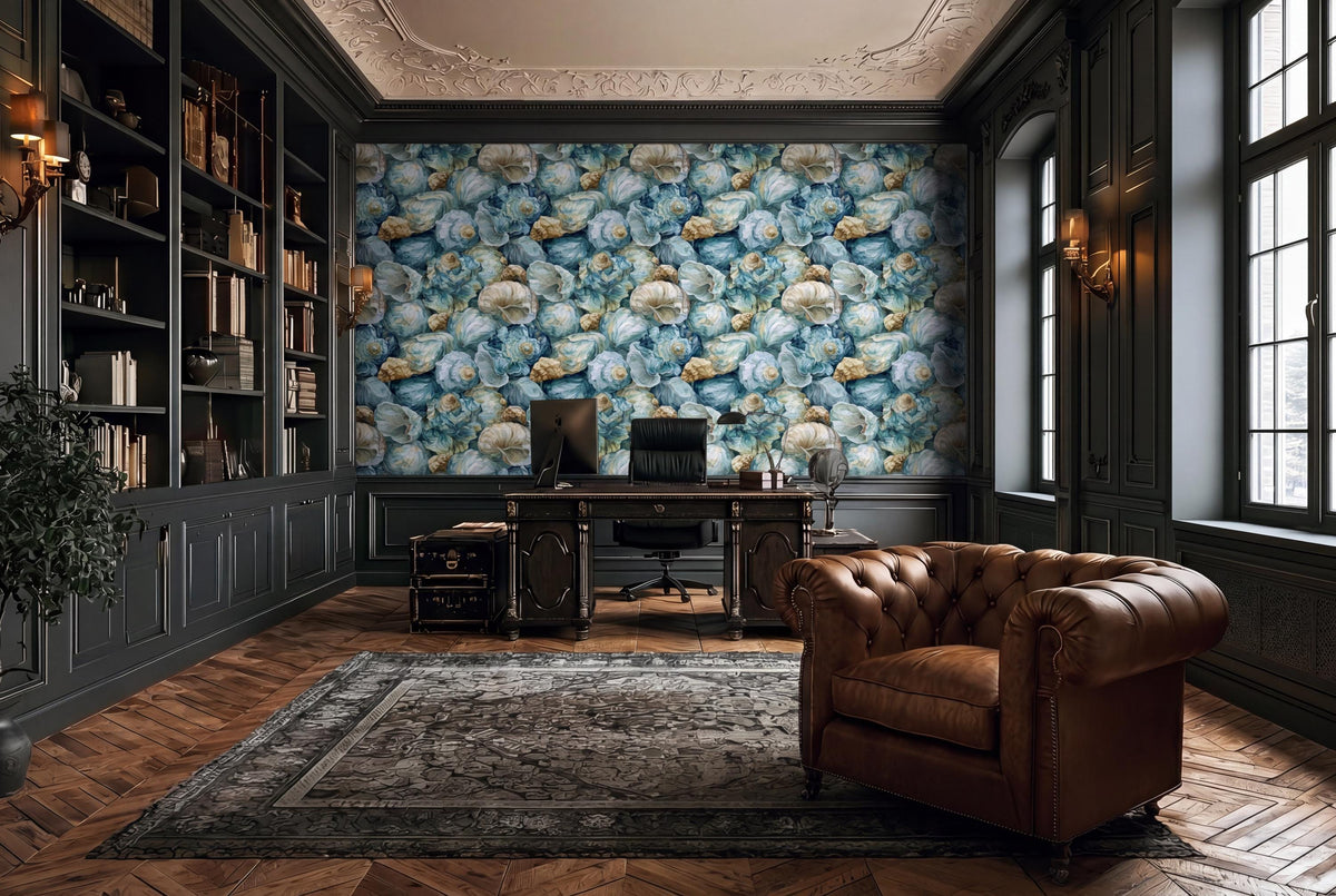 a luxurious and well-appointed home office with a large, colorful wallpaper featuring a floral pattern. The room is furnished with a leather armchair, a wooden desk, and a large bookshelf filled with books. The room has a high ceiling with ornate molding, and the floor is made of wood.