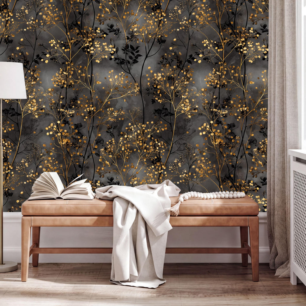 a wooden bench with an open book on it, placed against a wall with a black and gold floral wallpaper.