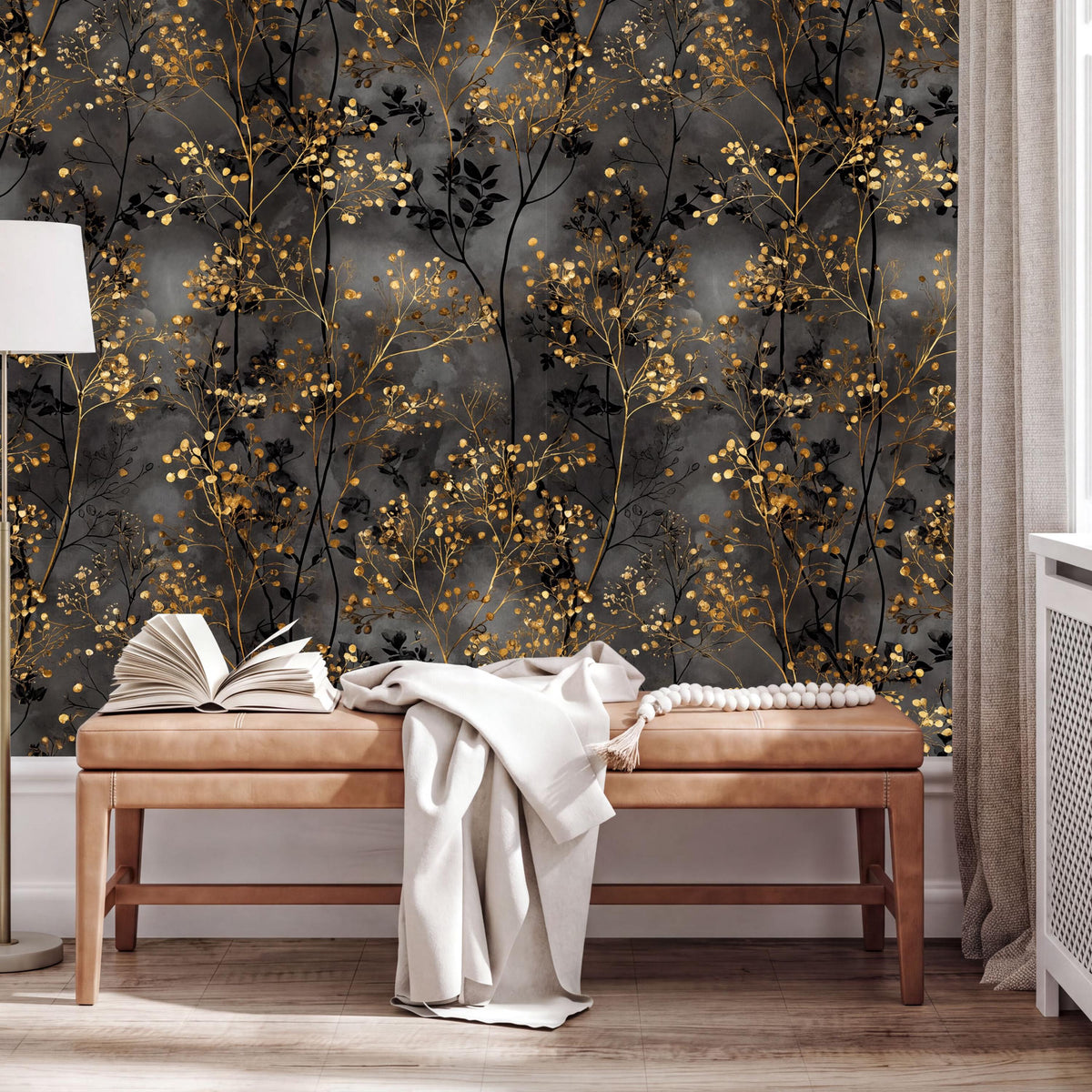 a wooden bench with an open book on it, placed against a wall with a black and gold floral wallpaper.