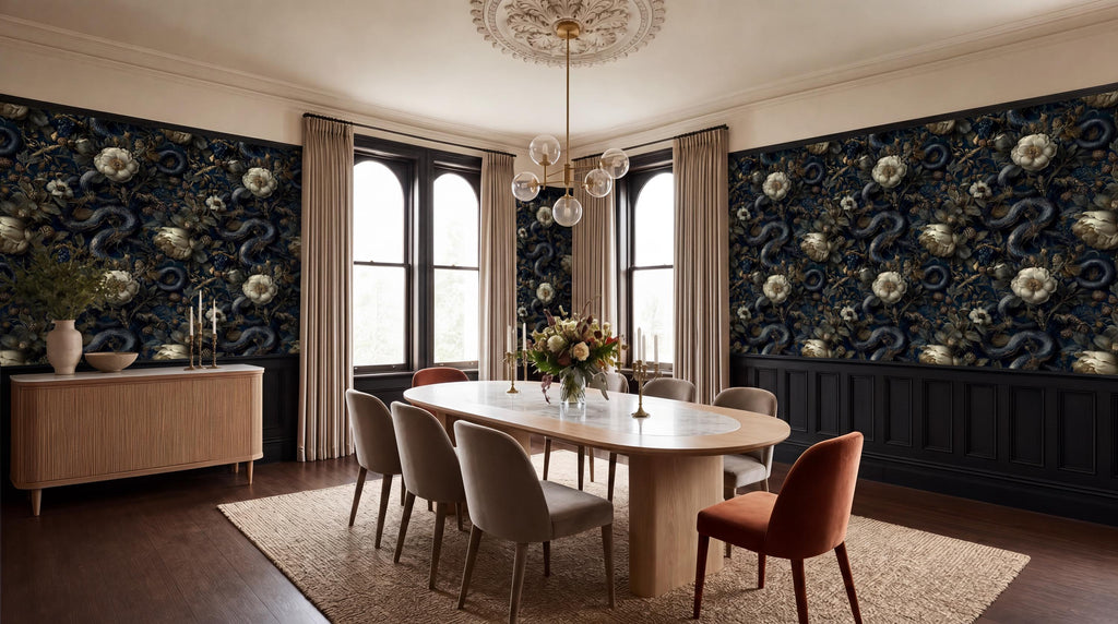 a luxurious dining room with a large wooden table surrounded by plush chairs, a chandelier overhead, and a striking black and white floral wallpaper.