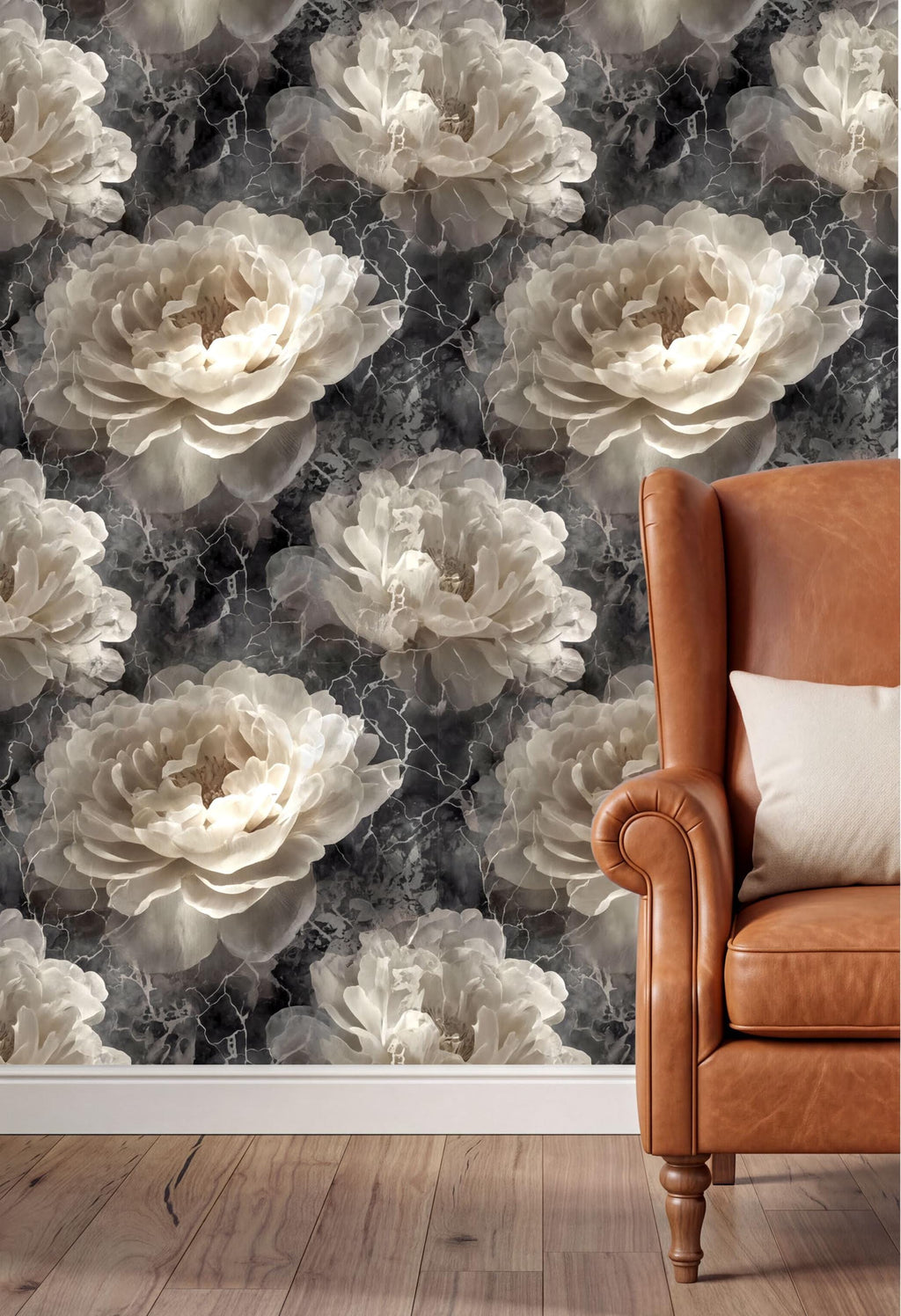 a large wallpapered wall with a repeating pattern of white and gray flowers, creating a striking and elegant visual effect. In the foreground, there is a brown leather armchair with a white pillow, adding a cozy and inviting touch to the room.