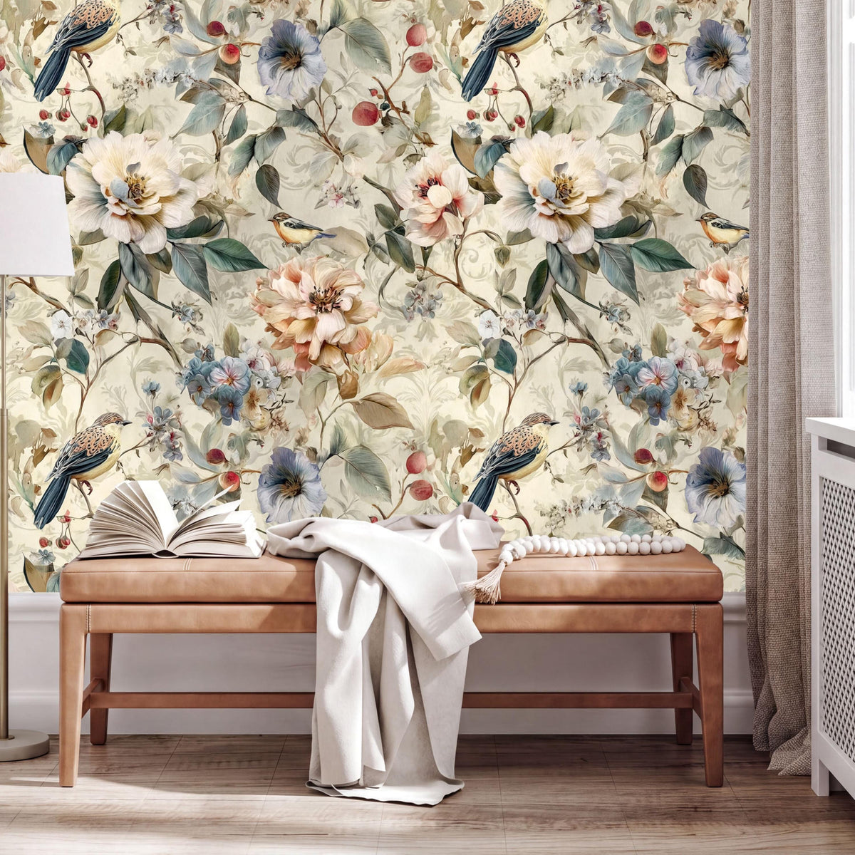 a large floral wallpaper with a variety of flowers and birds, creating a vibrant and nature-inspired atmosphere. In the foreground, there is a wooden bench with an open book and a white blanket draped over it. The overall scene conveys a sense of relaxation and comfort, with the natural elements of the wallpaper complementing the cozy setting.
