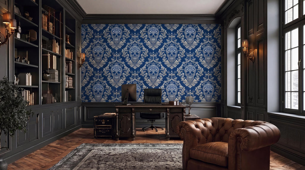 a luxurious and elegant home office with a large bookshelf, a patterned blue and white wallpaper, a brown leather armchair, and a wooden desk with a computer.