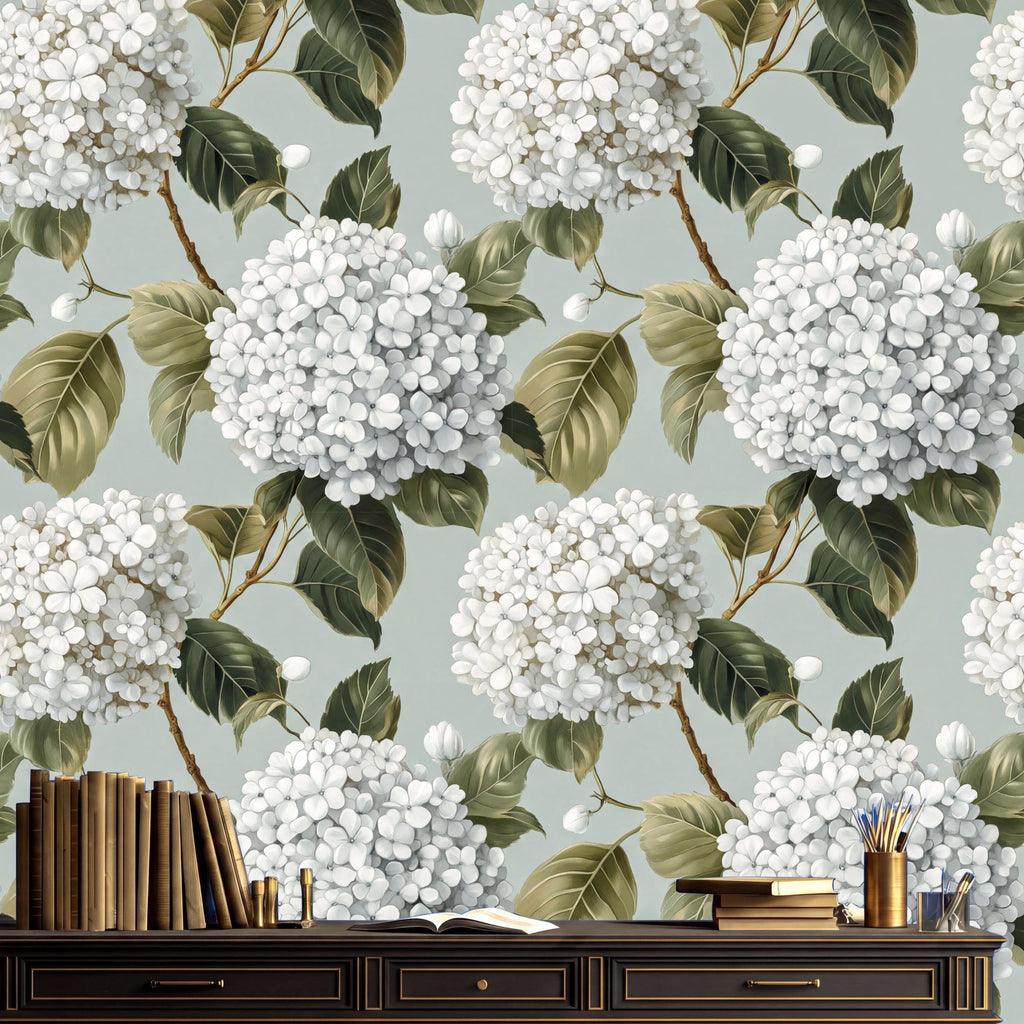 a wallpapered wall with a wooden shelf displaying a collection of books and a vase of flowers.