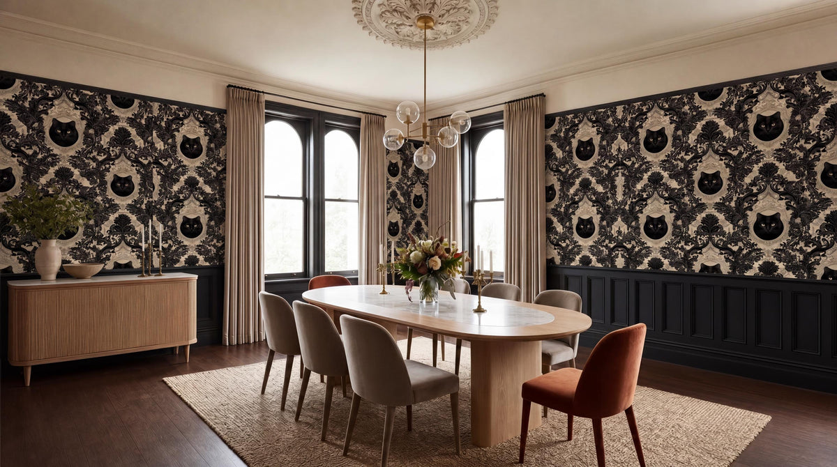 a formal dining room with a large wooden table surrounded by six chairs. The walls are adorned with black and white cat wallpaper, and the room features a chandelier, a large window, and a wooden floor.