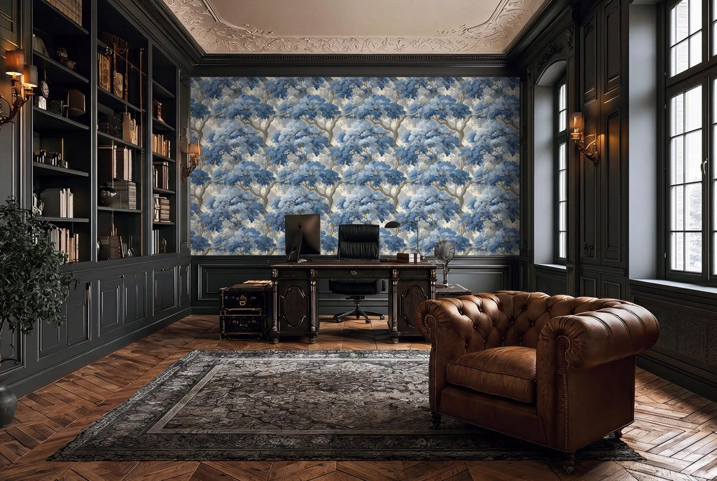 a luxurious and well-appointed home office with a large bookshelf, a tufted leather armchair, and a patterned wallpaper accent wall.