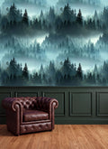 a dark brown leather armchair positioned in front of a wall with a forest-themed wallpaper.