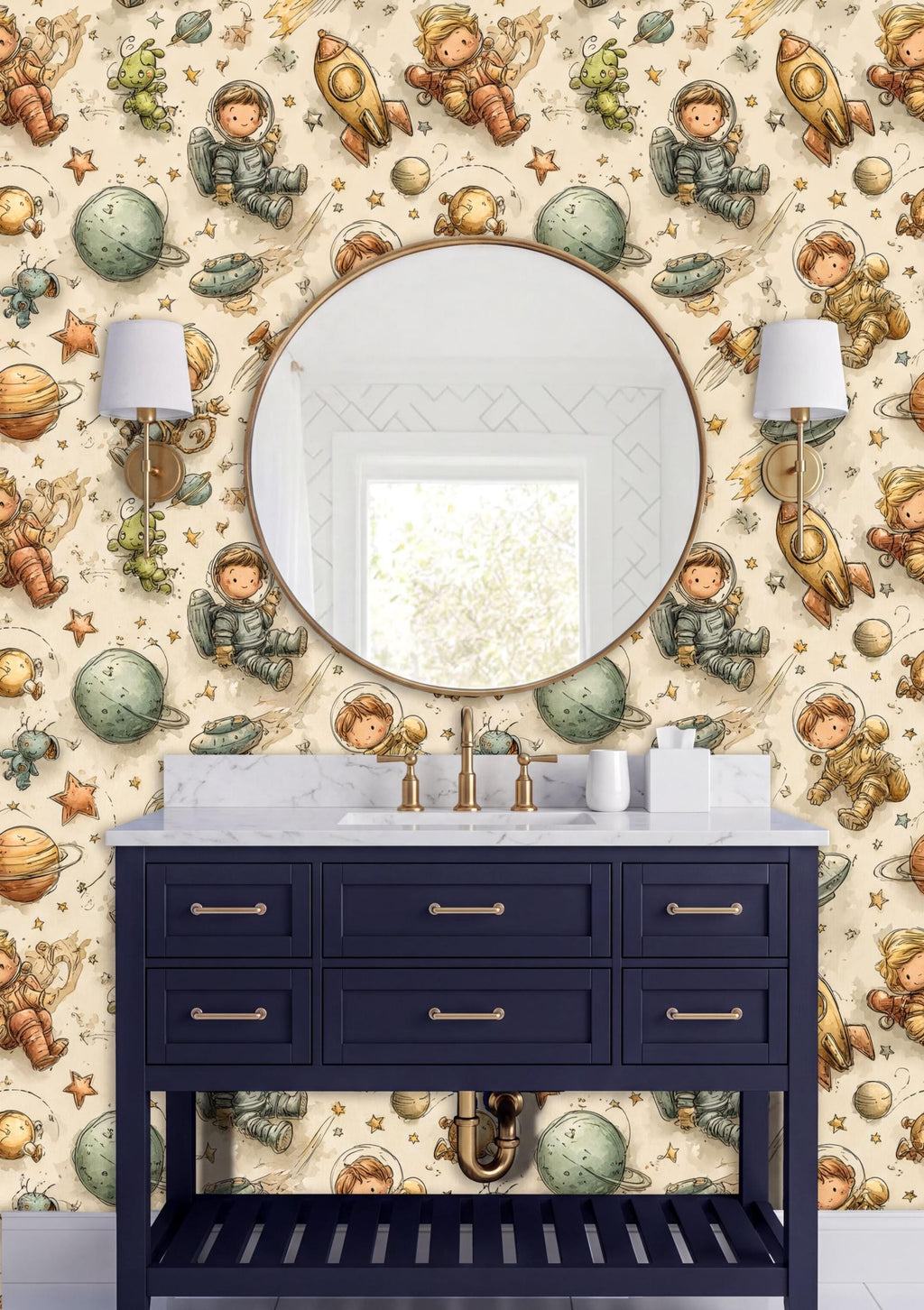 a bathroom with a round mirror, a blue vanity with gold handles, and a wallpapered wall with a space theme.
