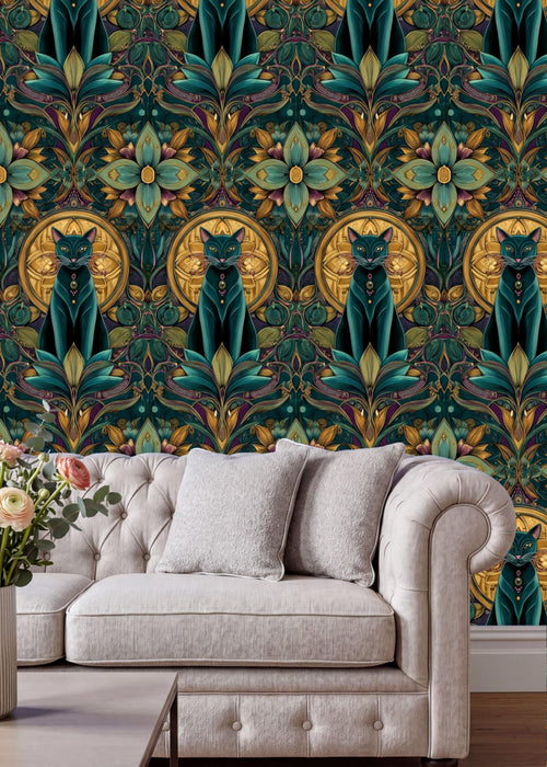 a white sofa with a floral patterned wallpaper behind it. The wallpaper has a repeating pattern of green cats and flowers in shades of green, gold, and pink. The sofa is positioned in front of the wall, creating a cozy and inviting atmosphere.
