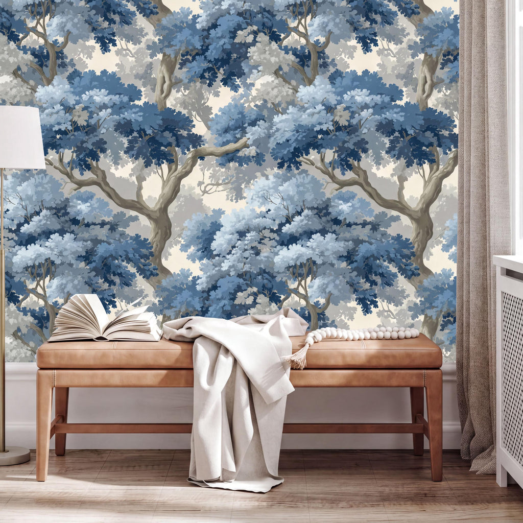 a wooden bench with an open book on it, situated in front of a large wallpapered wall with a blue and white forest scene.