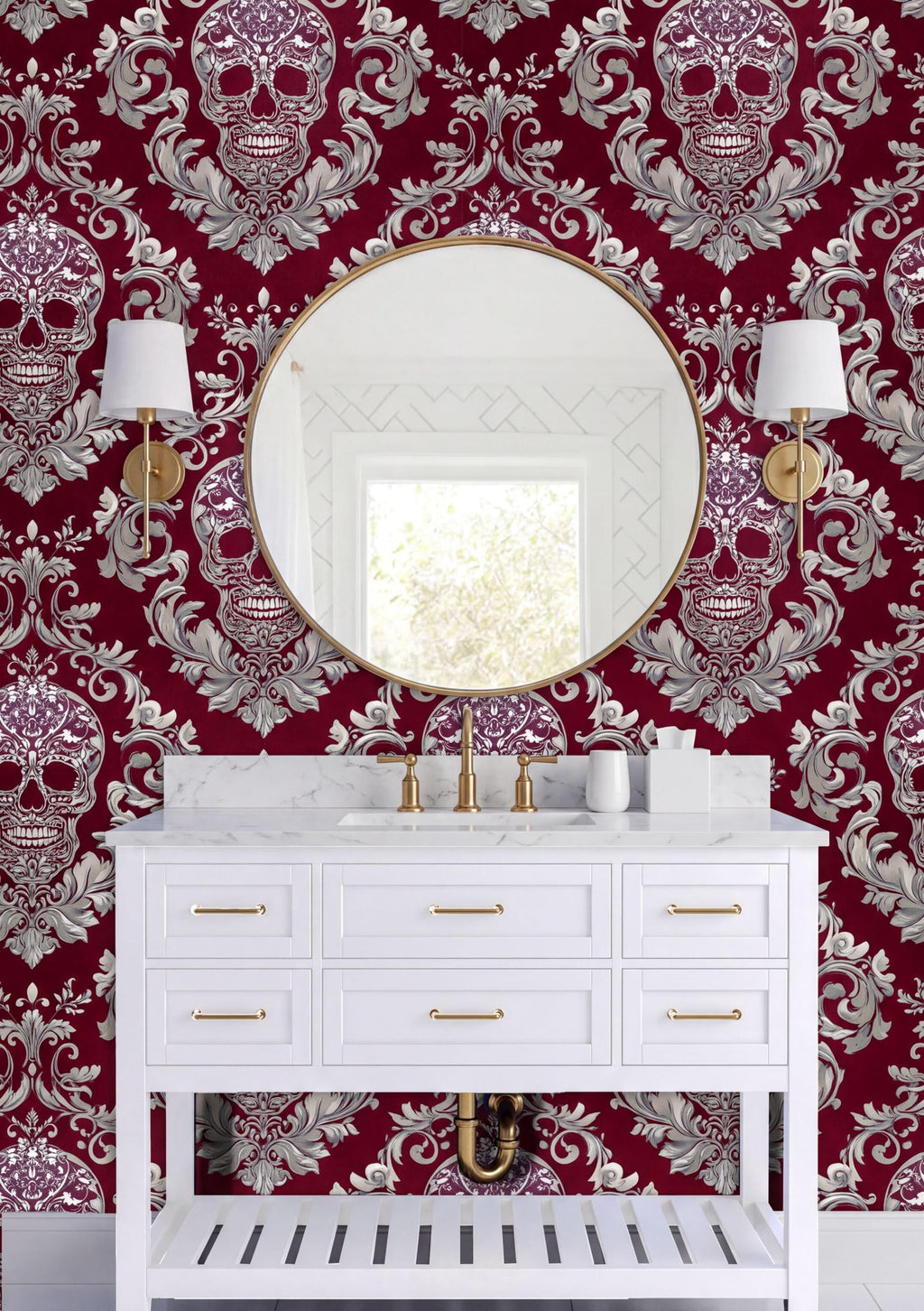 a bathroom with a white vanity and a large mirror above it. The walls are covered in a red and white patterned wallpaper, and there are two white sconces on either side of the mirror.