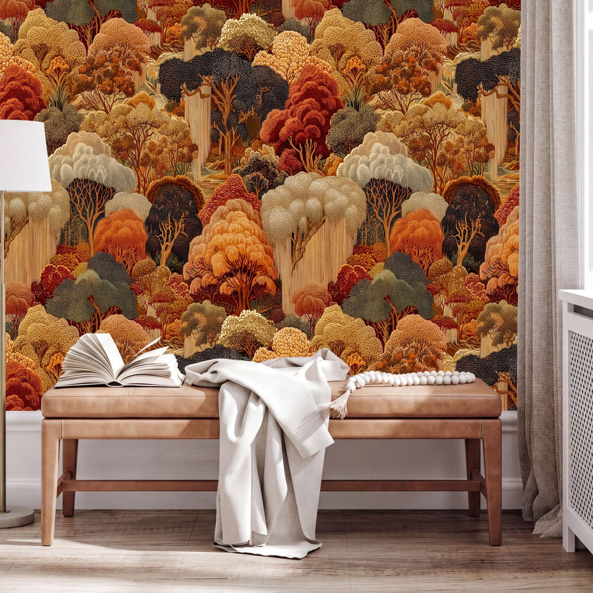 a large, colorful mural depicting a lush, forested landscape with various shades of orange, yellow, and green. The mural is set against a white wall, creating a striking contrast. In the foreground, there is a wooden bench with an open book and a white blanket draped over it. The overall scene conveys a sense of tranquility and natural beauty.