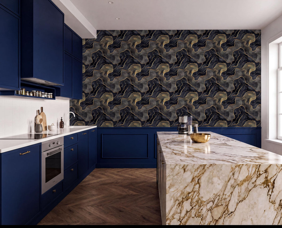 The image showcases a modern kitchen with a marble countertop and dark blue cabinets. The marble countertop has a gold bowl on it, and the walls are covered in a black and gold patterned wallpaper. The kitchen also features a stainless steel oven and a sink.