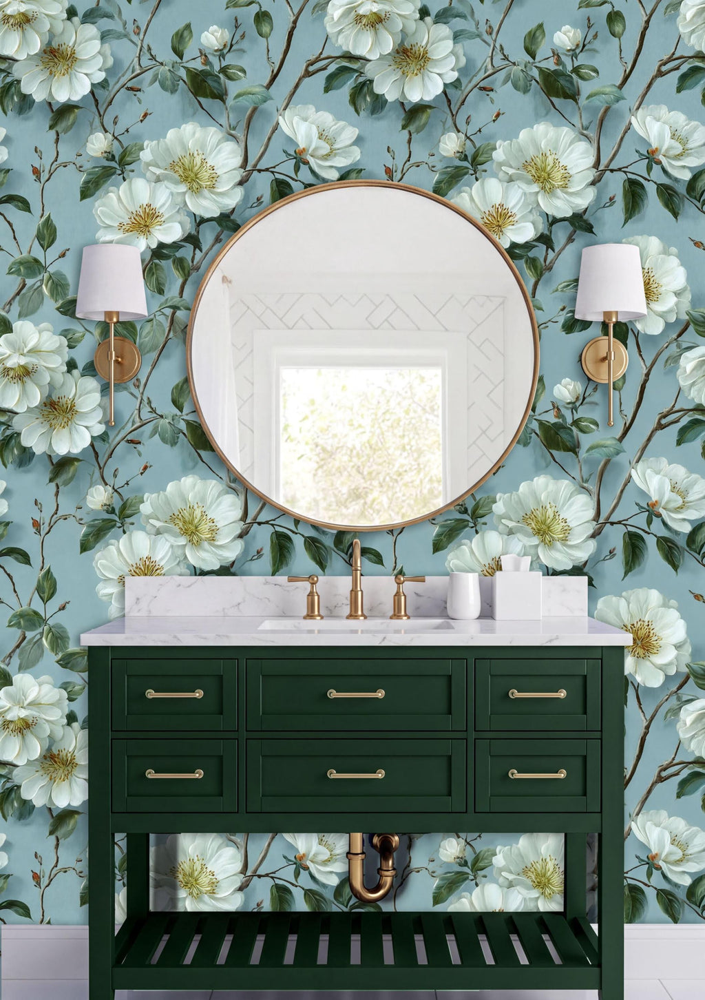 a bathroom vanity with a green cabinet and a round mirror above it, set against a wall with a floral wallpaper.