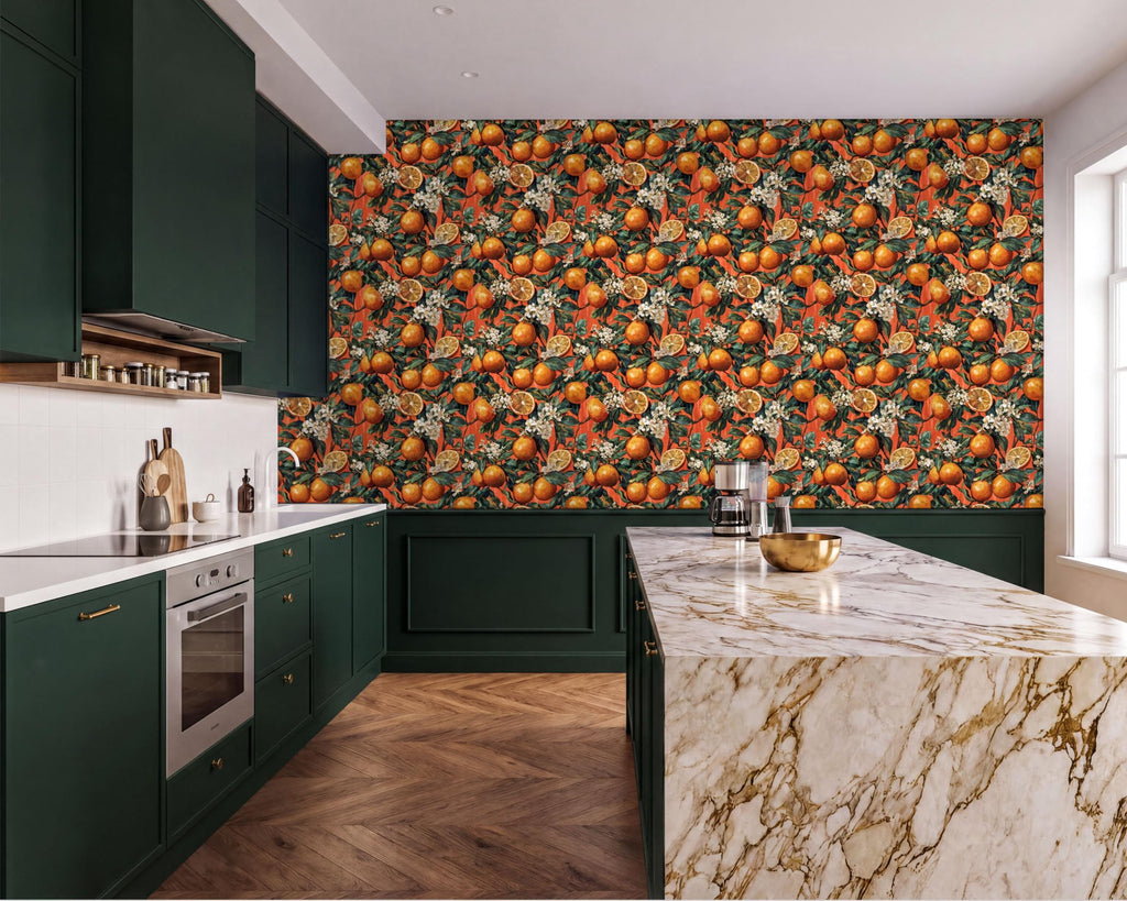 a modern kitchen with a marble countertop and dark green cabinets. The walls are adorned with a vibrant orange and green floral wallpaper, creating a warm and inviting atmosphere. The kitchen is equipped with a stove, oven, and sink, and features a large island with a marble countertop.
