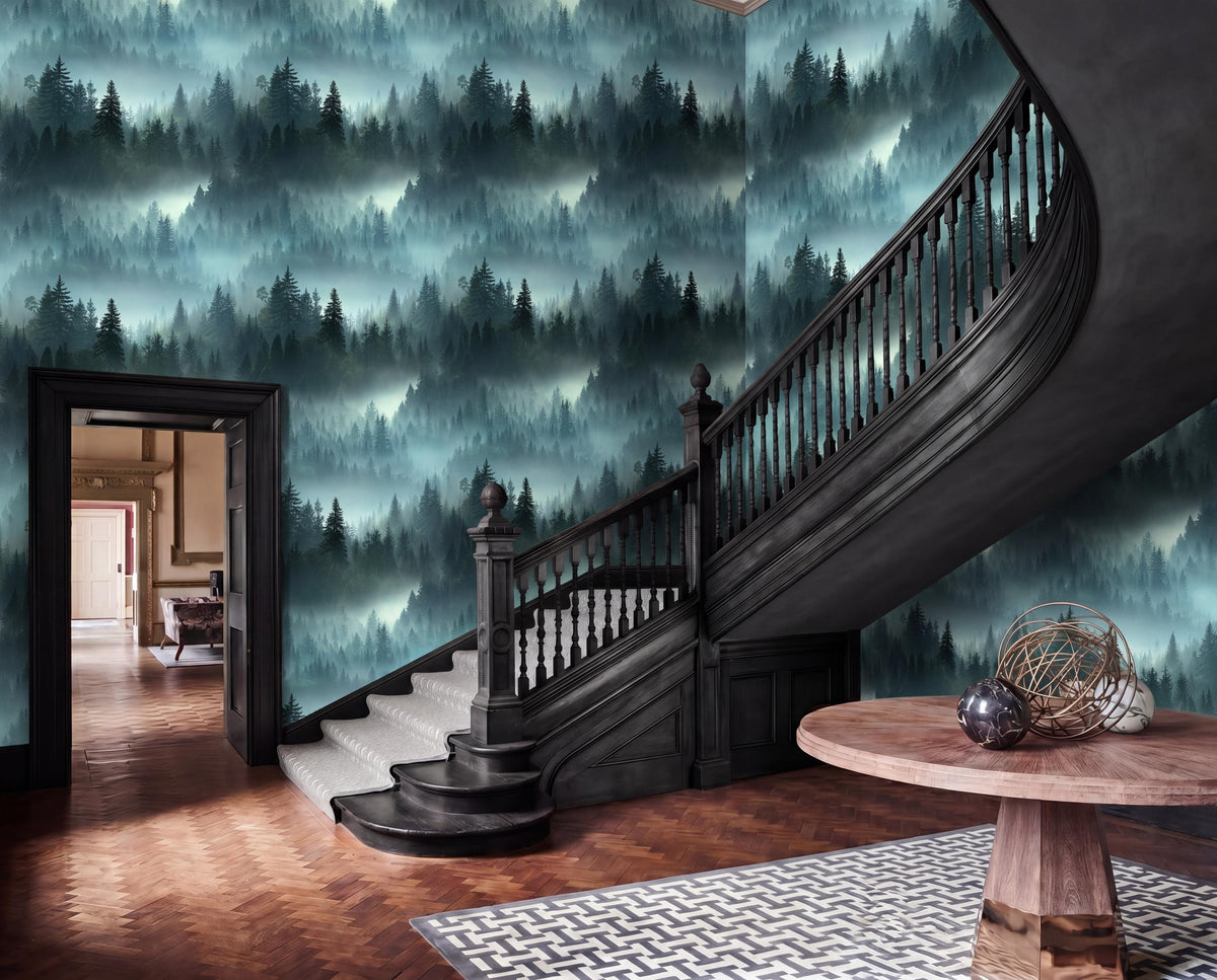 a grand staircase with a wooden railing and steps, leading up to a wooden table with a vase on top. The staircase is set against a wall with a forest wallpaper, creating a serene and natural atmosphere. The room also includes a doorway and a rug, adding to the overall aesthetic of the space.