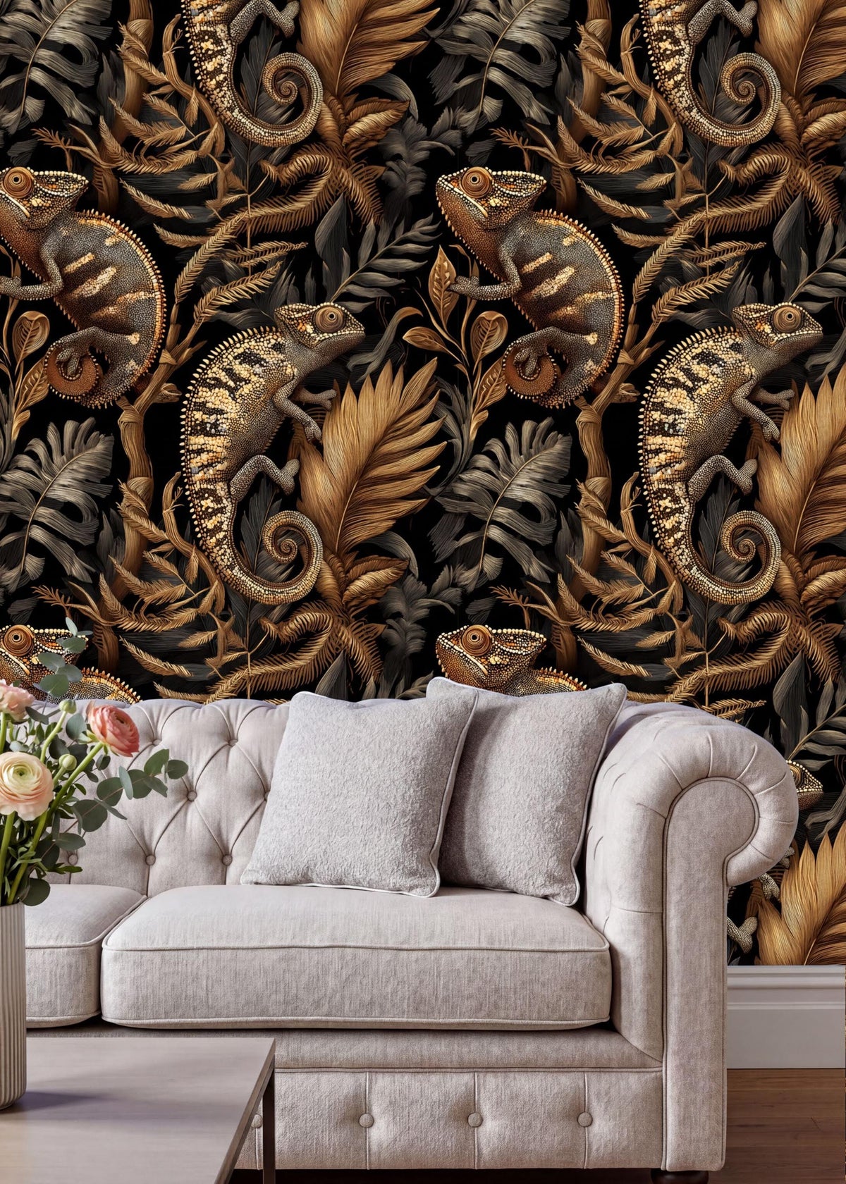 a luxurious living room with a white tufted sofa and a coffee table. The sofa is positioned against a wall with a striking wallpaper design of gold and black leaves and chameleons. The room has a modern and elegant aesthetic, with the white sofa and the gold and black leaf wallpaper creating a harmonious and sophisticated atmosphere.