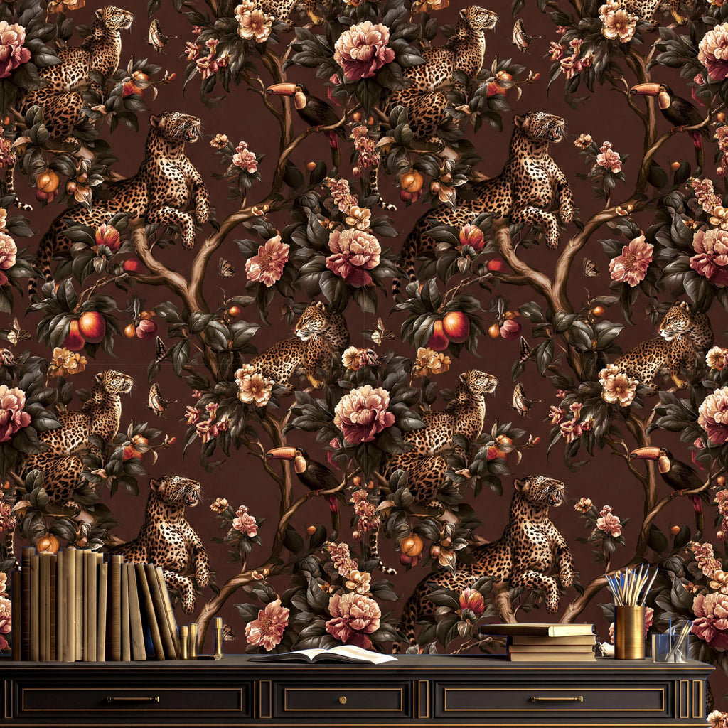 a wallpapered wall with a detailed floral pattern, including various animals such as leopards and birds. On a table below the wall, there are several books and a vase, suggesting a cozy and intellectual atmosphere.