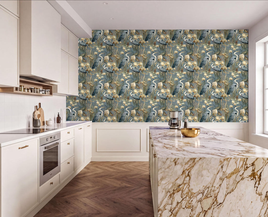 a modern kitchen with a marble countertop and a large wallpapered wall featuring a repeating pattern of birds and flowers in shades of blue and green.