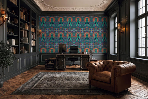 a luxurious and well-appointed home office with a large, colorful patterned wallpaper covering the wall behind a desk and a comfortable leather armchair.