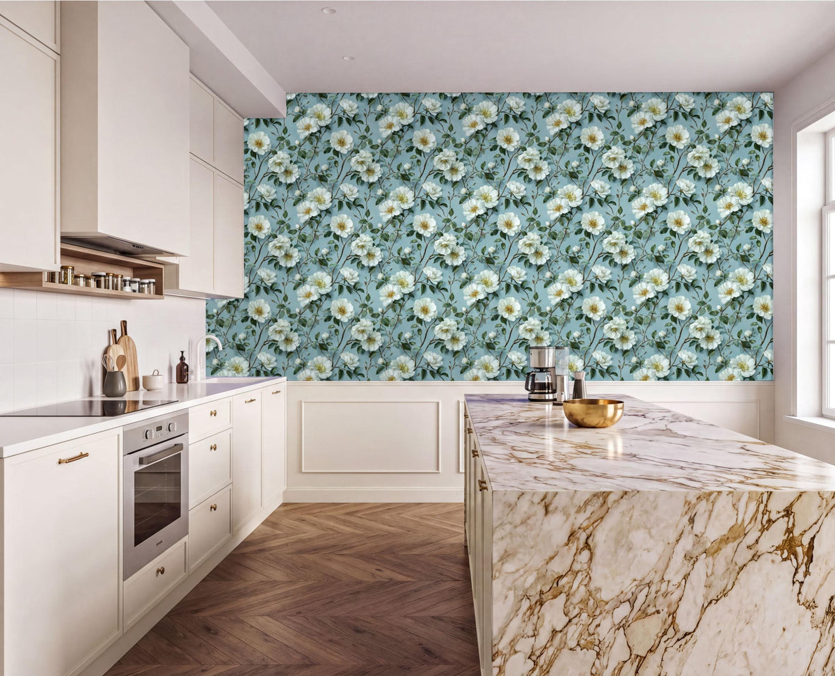 a modern kitchen with a marble countertop and a floral wallpaper behind it. The kitchen features white cabinets and a large island with a marble top.