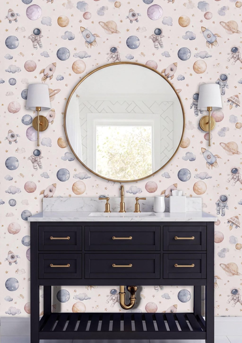 a bathroom with a black vanity and a round mirror above it. The walls are decorated with a space-themed wallpaper, and there are two white lamps on either side of the mirror.