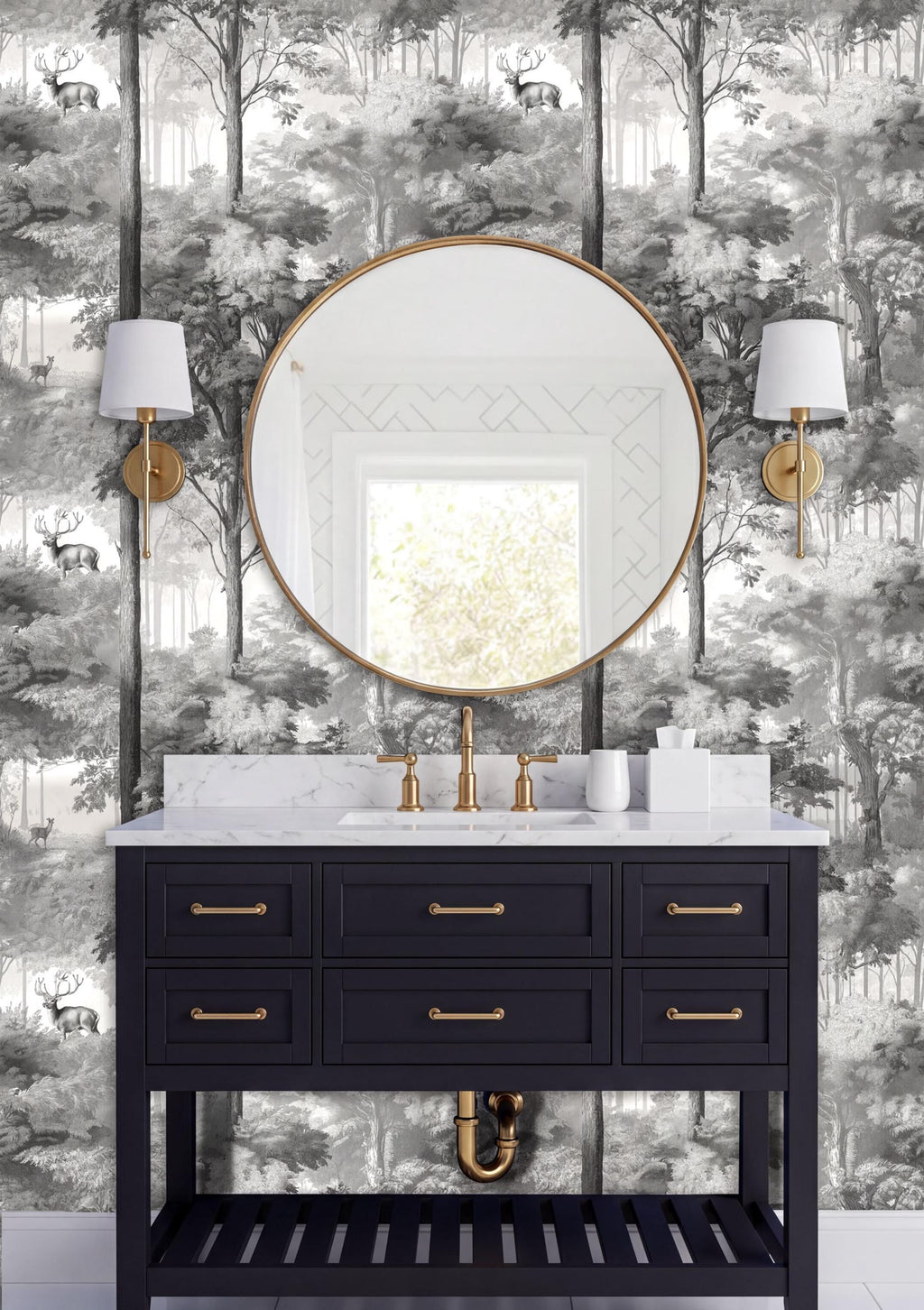 a bathroom vanity with a black cabinet, a round mirror, and two wall sconces. The vanity has a white countertop and is set against a wall with a black and white wallpaper pattern depicting a forest scene.