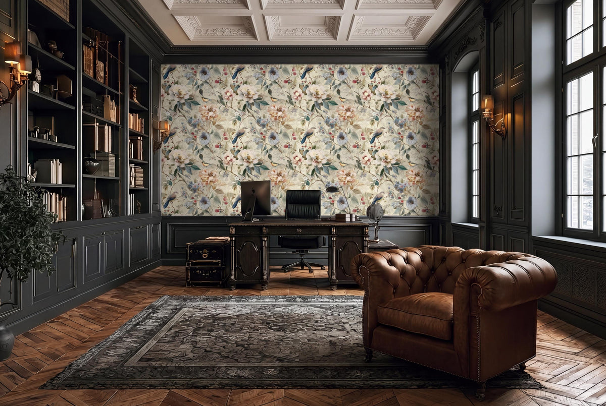 a luxurious and well-appointed home office with a large floral wallpaper, dark wood furniture, and a tufted leather armchair.