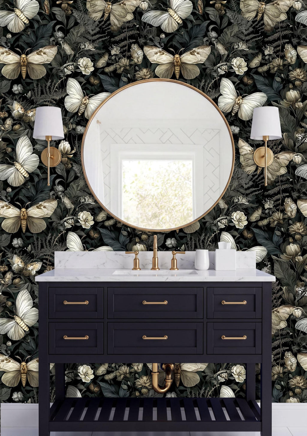 a bathroom vanity with a black countertop and gold fixtures, set against a wallpapered wall with a butterfly and fern motif. The vanity has a round mirror above it, and two wall sconces are mounted on either side of the mirror.