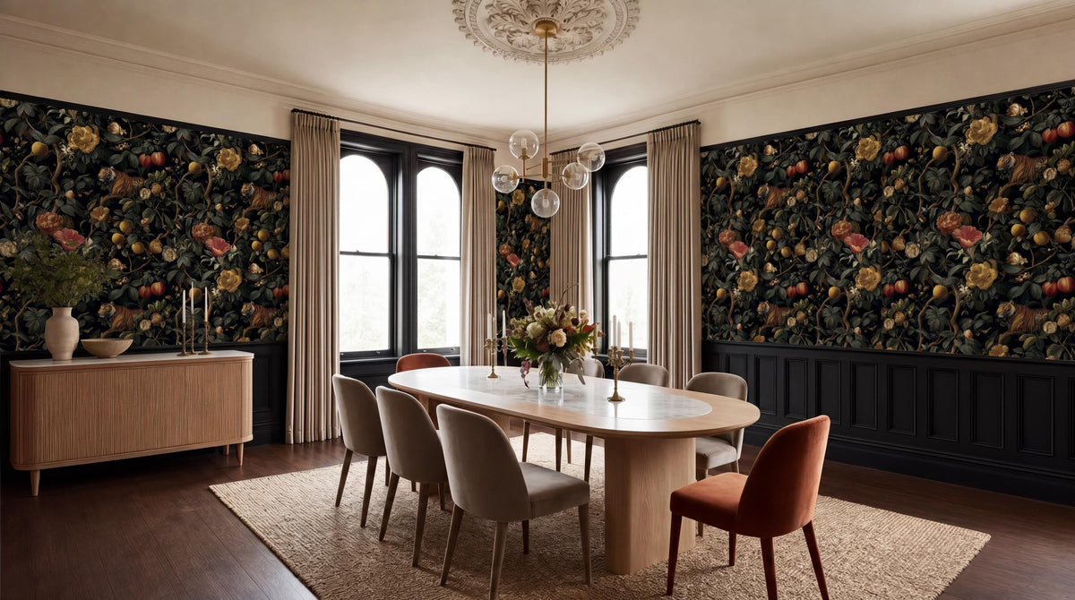 a spacious and elegantly decorated dining room with a large wooden table surrounded by plush chairs. The walls are adorned with a floral wallpaper, and the room features a chandelier, a large window, and a wooden floor.