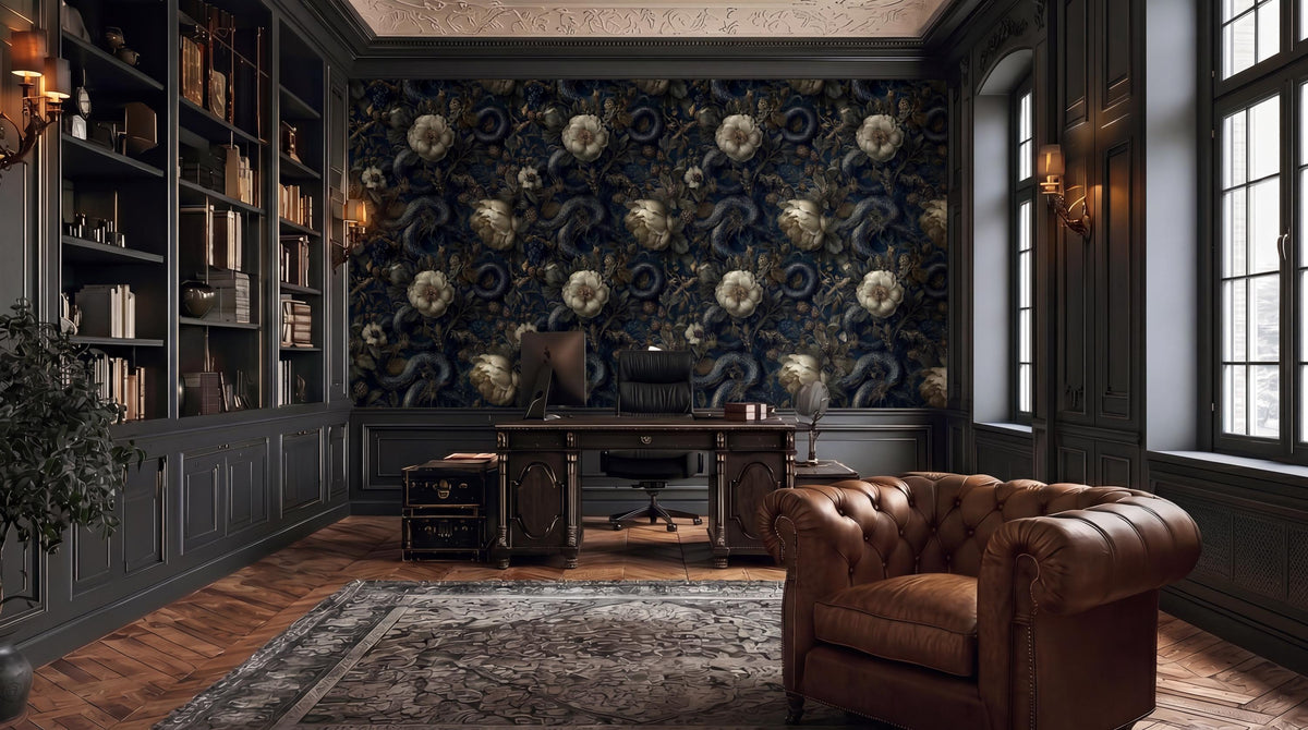 a luxurious and elegant living room with a large bookshelf, a tufted leather armchair, and a patterned wallpaper accent wall.