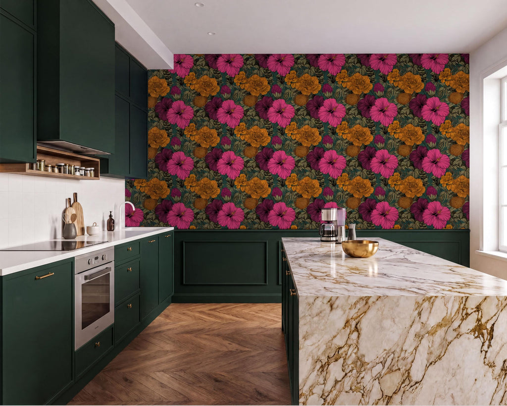 a modern kitchen with a large, colorful floral wallpaper on the wall behind the marble countertop. The kitchen features dark green cabinets, a marble countertop, and a large window.