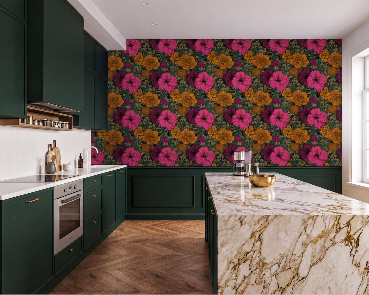 a modern kitchen with a large, colorful floral wallpaper on the wall behind the marble countertop. The kitchen features dark green cabinets, a marble countertop, and a large window.