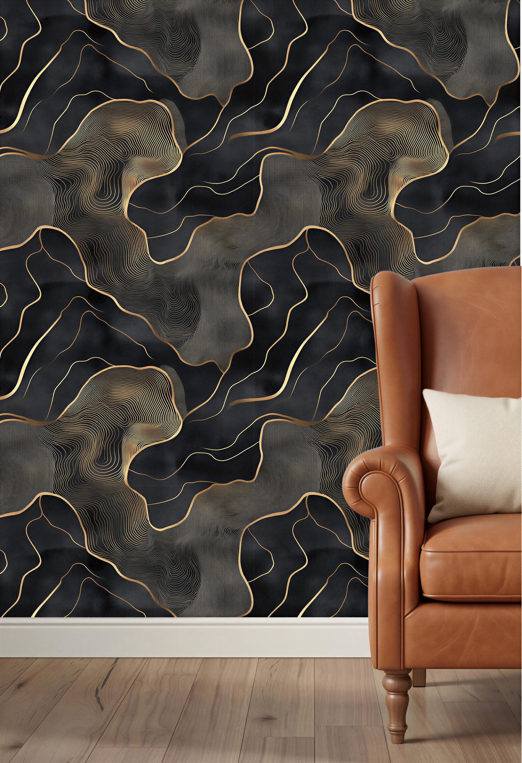 a dark and luxurious wallpaper with a striking gold and black abstract pattern. The wallpaper is displayed on a wall, and a brown leather armchair is positioned next to it, creating a cozy and stylish living space.
