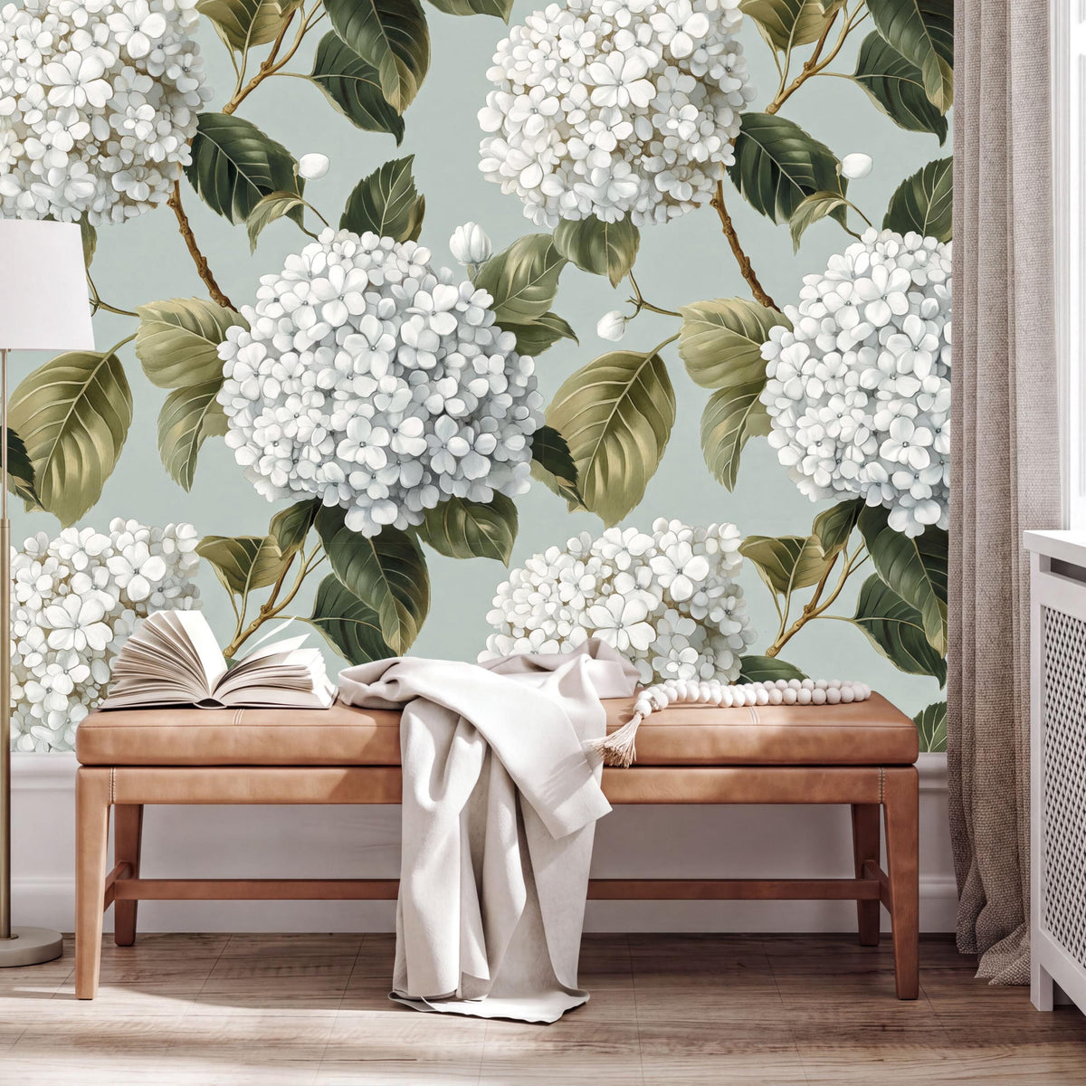 a wooden bench with an open book on it, set against a wall with a large floral wallpaper.