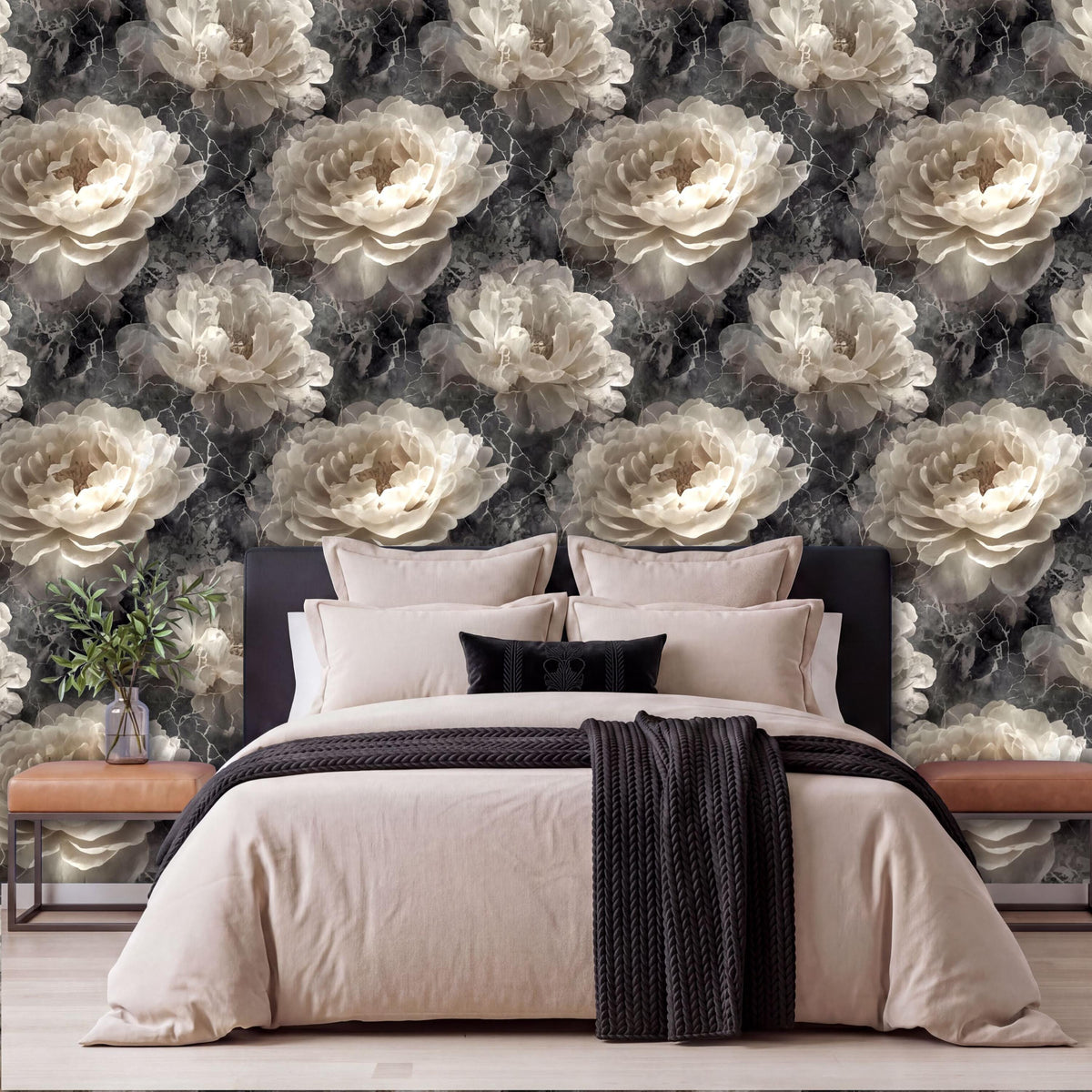 a bedroom with a large bed, dark headboard, and a black and white floral wallpaper behind it.