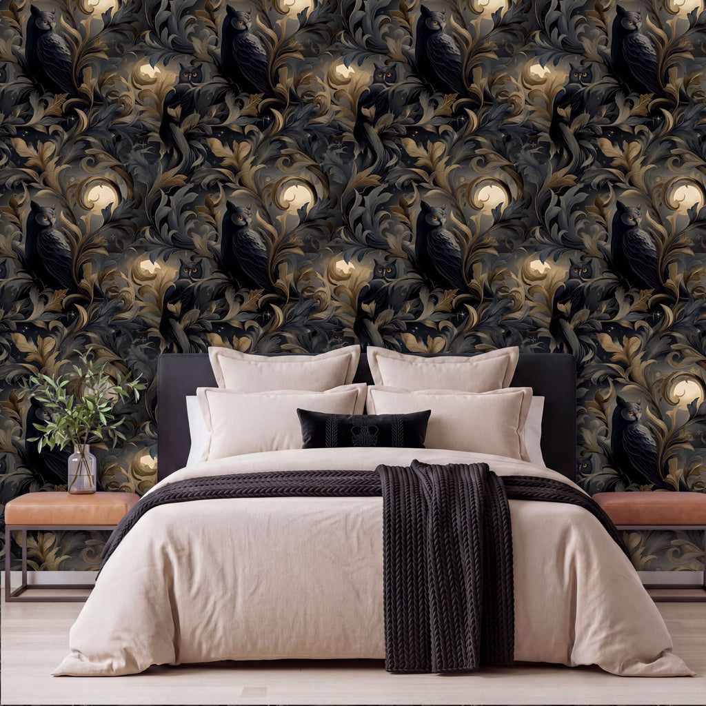 a bedroom with a large bed, dark and light brown bedding, and a black and white throw blanket. The bed is positioned against a wall with a repeating pattern of owls and moon motifs in shades of black and gold.