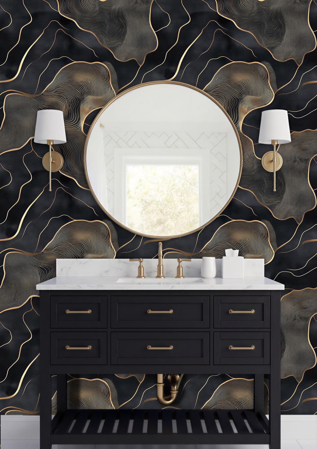 a bathroom vanity with a black cabinet, a round mirror, and two wall sconces. The vanity has a white countertop and is set against a black and gold wallpaper with a swirling pattern.
