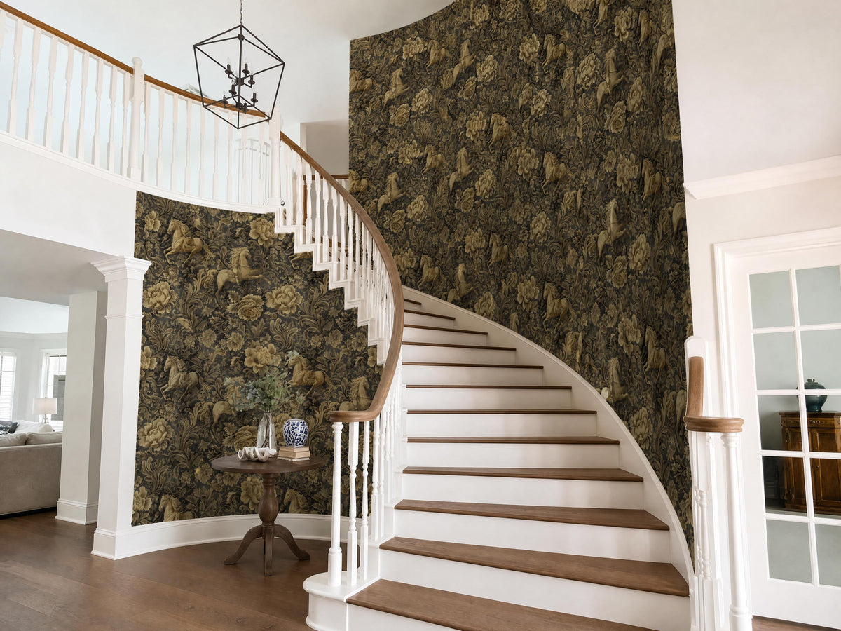 a grand staircase with a wooden railing and a white step, leading up to a second floor. The walls are covered in a dark, ornate wallpaper with a floral pattern. The room also features a chandelier hanging from the ceiling, a small table with a vase and a book, and a doorway leading to another room.