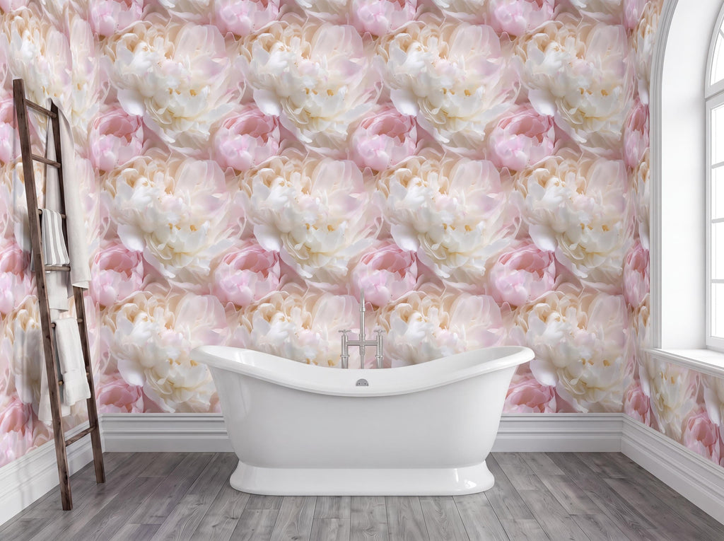 a bathroom with a white freestanding bathtub in the center, surrounded by a wall covered in a repeating pattern of pink and white flowers. The wall is decorated with a floral wallpaper, creating a serene and elegant atmosphere.