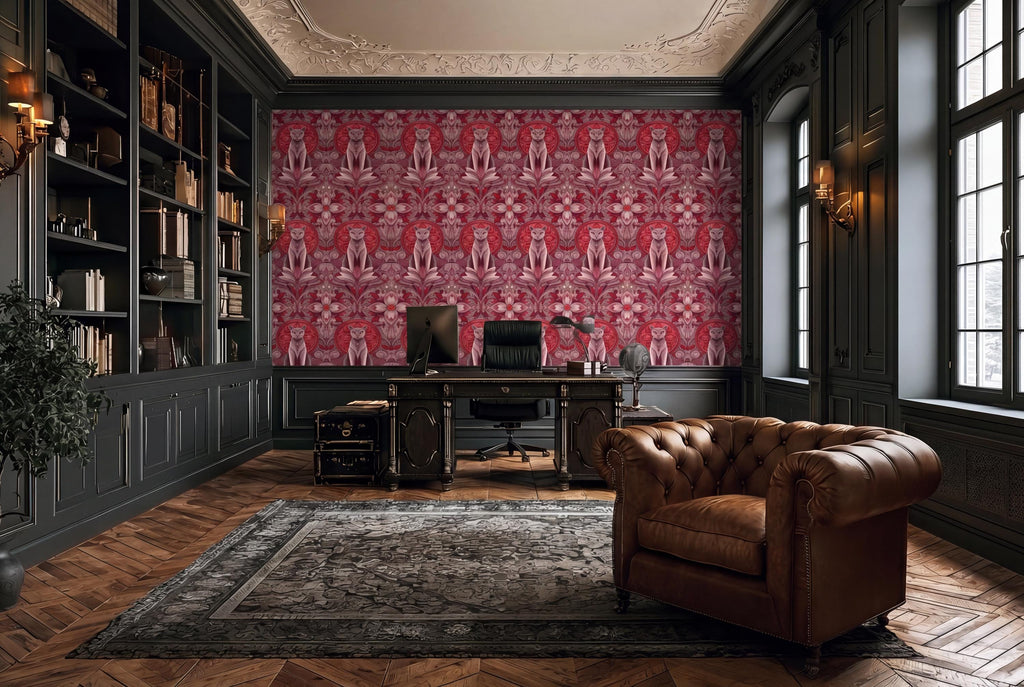 a luxurious and elegant home office with a large, ornate red and white patterned wallpaper covering the wall behind a desk. The room is furnished with a leather armchair, a wooden desk, and a large window with dark wood paneling. The overall design and decor create a sophisticated and inviting atmosphere.
