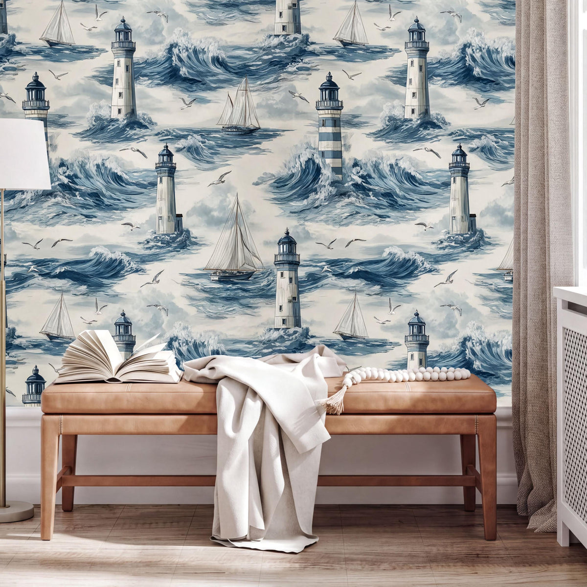 a wallpapered wall with a nautical theme, depicting a lighthouse surrounded by waves and boats. In front of the wall, there is a wooden bench with an open book and a white blanket on it.