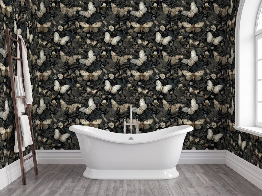 a bathroom with a white freestanding bathtub in the center, surrounded by a wall covered in a black and white butterfly wallpaper.
