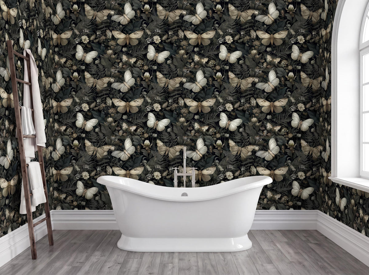 a bathroom with a white freestanding bathtub in the center, surrounded by a wall covered in a black and white butterfly wallpaper.